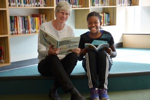 Julie Hunt shares some quiet time together with student Beatrice Audain.