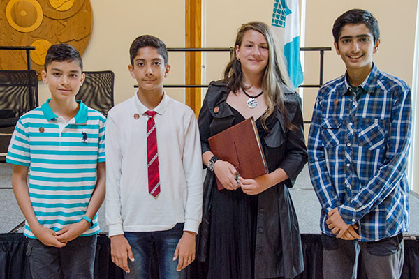 Students from Hollyburn Elementary were honoured for their winning entries in the “Imagine a Canada” contest organized by the National Centre for Truth and Reconciliation. In photo: (L-R) Sam Talaifar, Aryan MosavianPour, Andra Pope and Ali Aryaeinia. Absent: Leila Cavers.